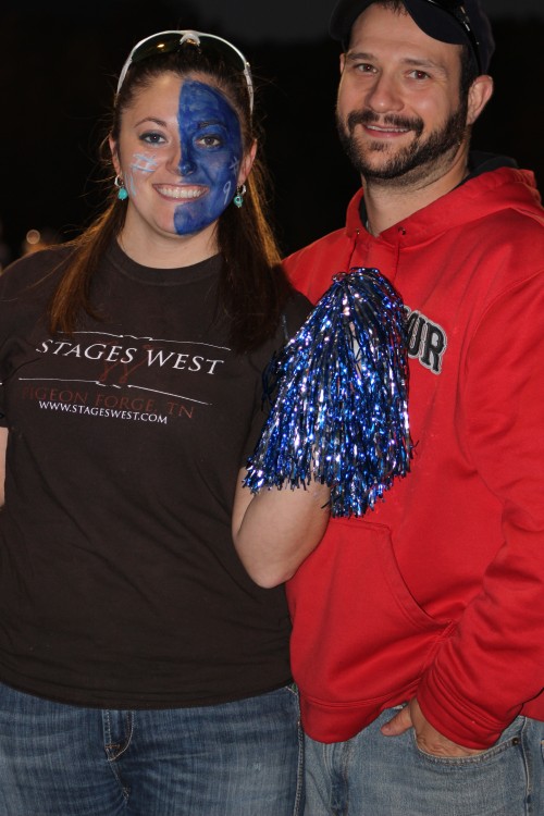 Houseparents Ronnie and Linda Angle route on the boys at a Clifton Middle School football game.